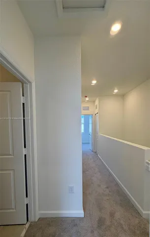 a view of hallway with a hallway