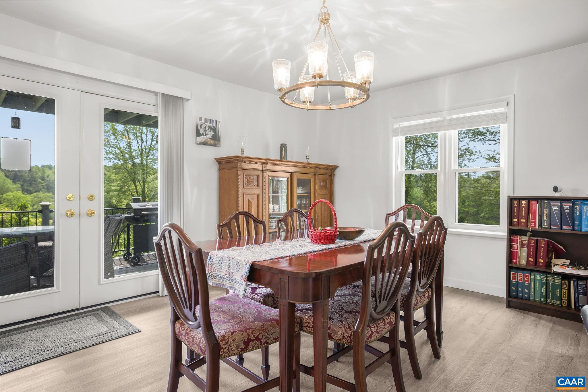 1701 Harrington Road Gordonsville, VA 22942 - Photo 11 of 28 a view of a dining room with furniture window and wooden floor