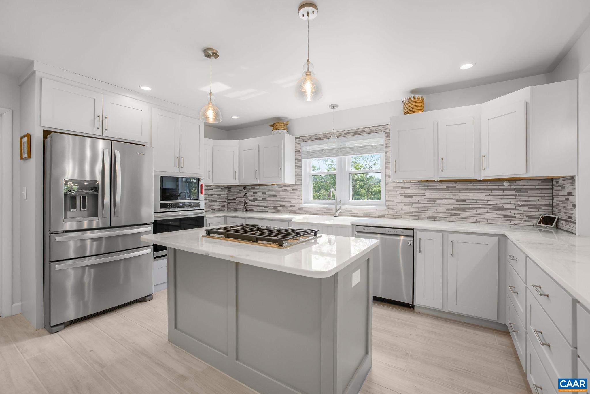 1701 Harrington Road Gordonsville, VA 22942 - Photo 13 of 28 a kitchen with appliances a sink and window