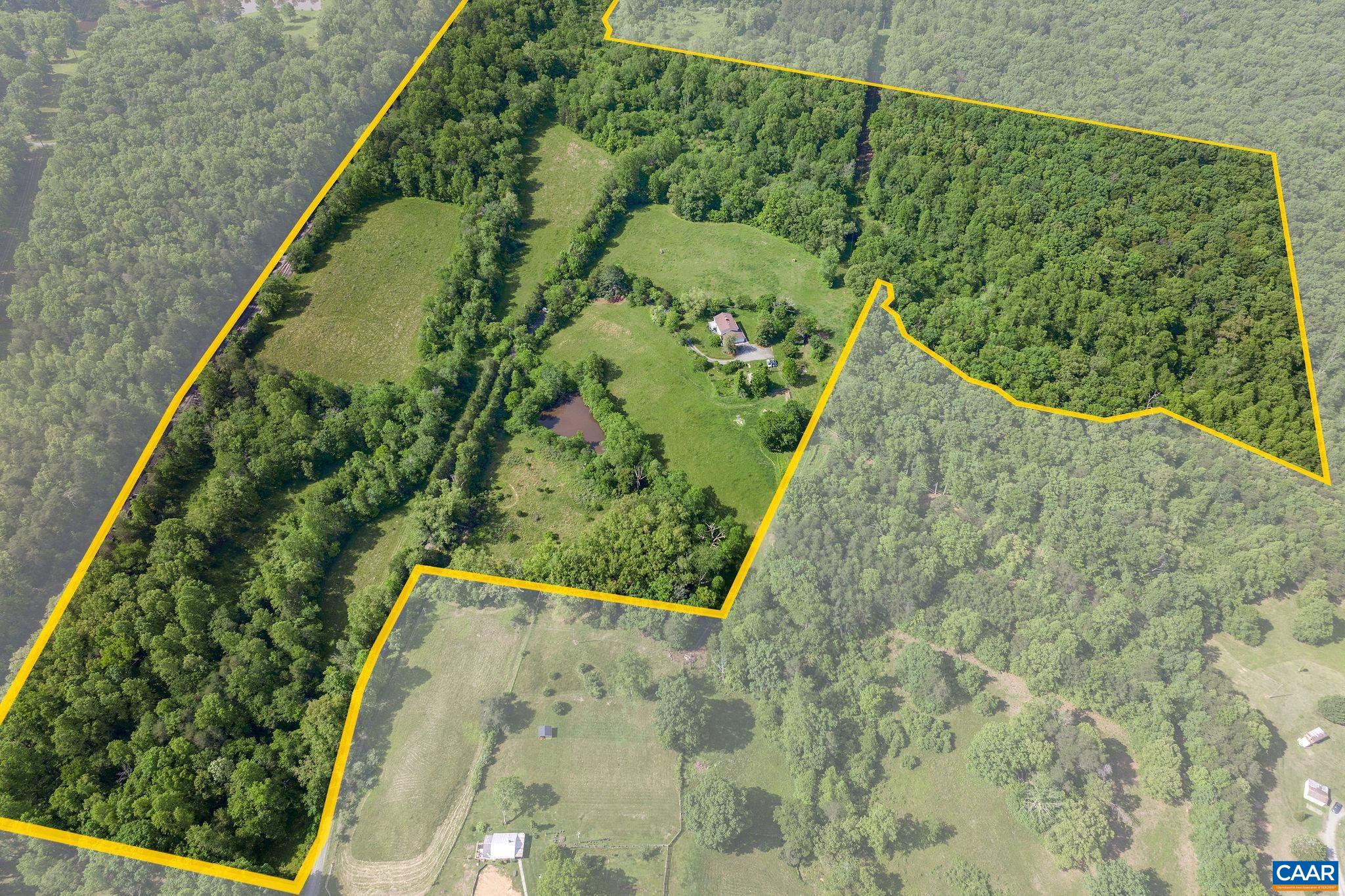 1701 Harrington Road Gordonsville, VA 22942 - Photo 2 of 28 a view of a yard with plants