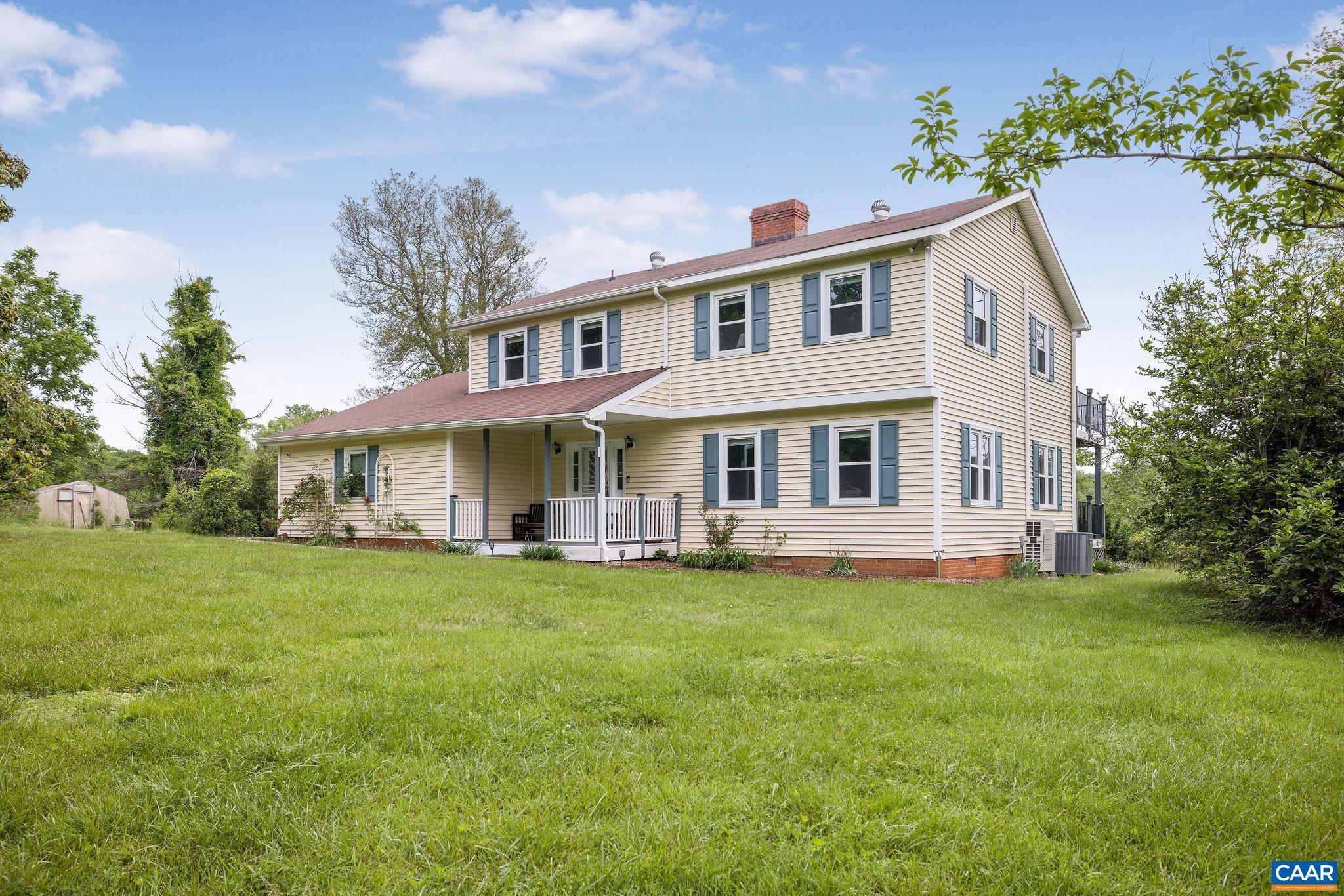 1701 Harrington Road Gordonsville, VA 22942 - Photo 6 of 28 a view of a house with a yard