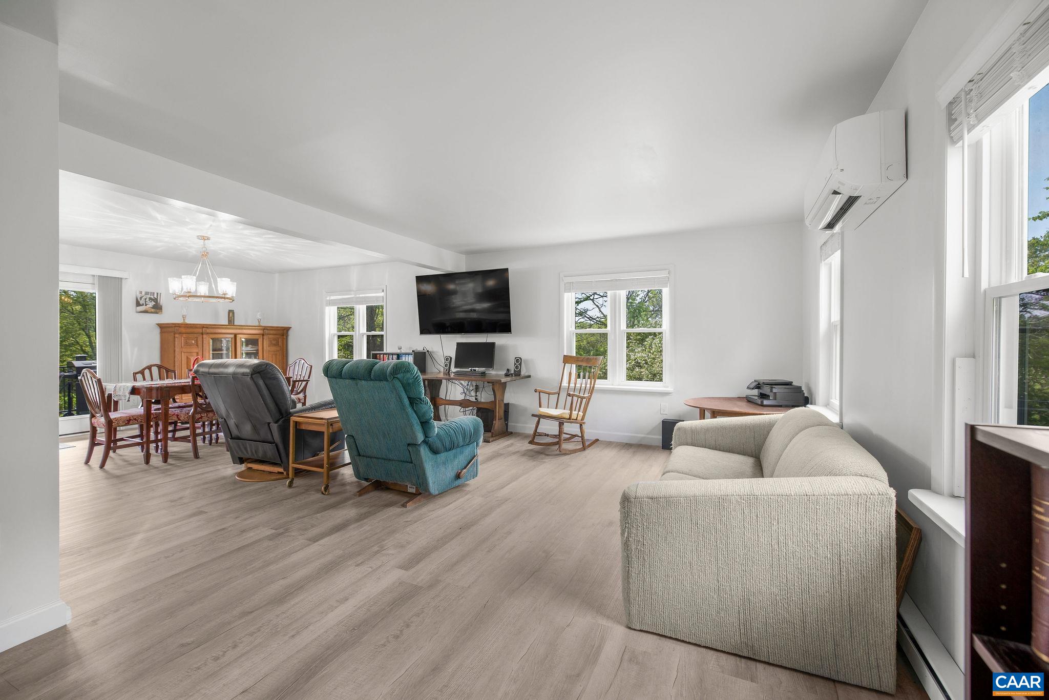 1701 Harrington Road Gordonsville, VA 22942 - Photo 9 of 28 a living room with furniture flat screen tv and window