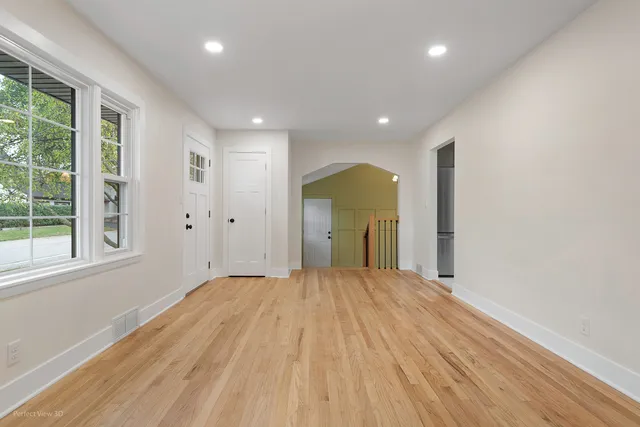 a view of a livingroom with a staircase