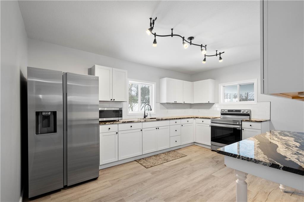 30 Evans Road Charleroi, PA 15022 - Photo 11 of 34 a kitchen with granite countertop stainless steel appliances and wooden cabinets
