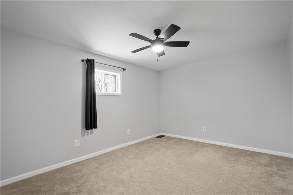 30 Evans Road Charleroi, PA 15022 - Photo 20 of 34 a view of a big room with wooden floor and windows in a room