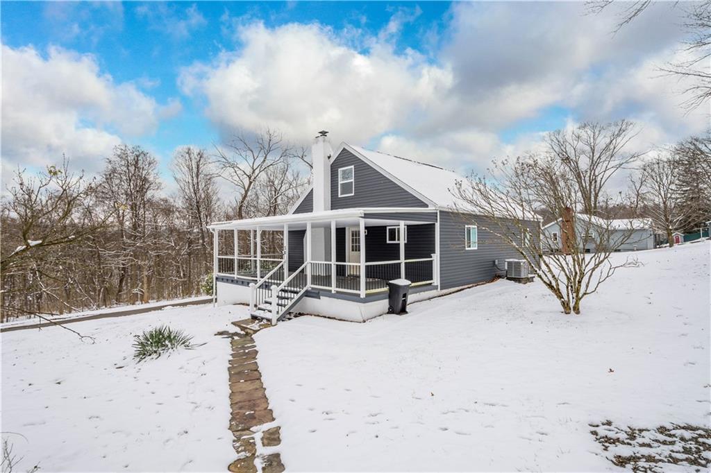 30 Evans Road Charleroi, PA 15022 - Photo 28 of 34 a view of a house with a yard covered in snow
