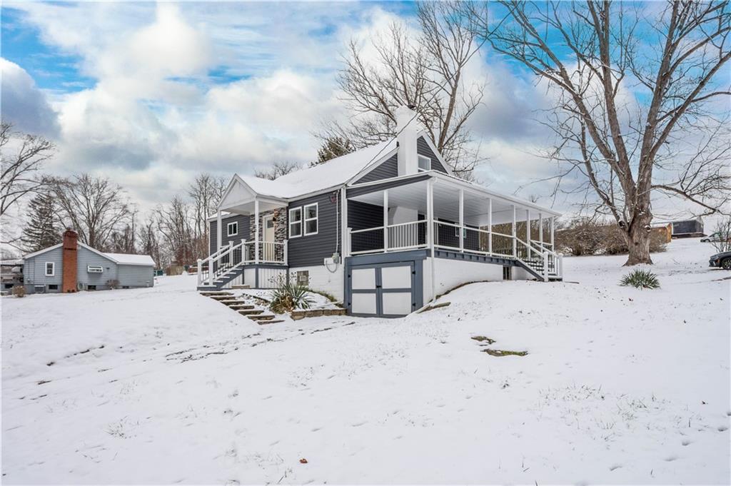 30 Evans Road Charleroi, PA 15022 - Photo 3 of 34 a view of a house with snow on the snow