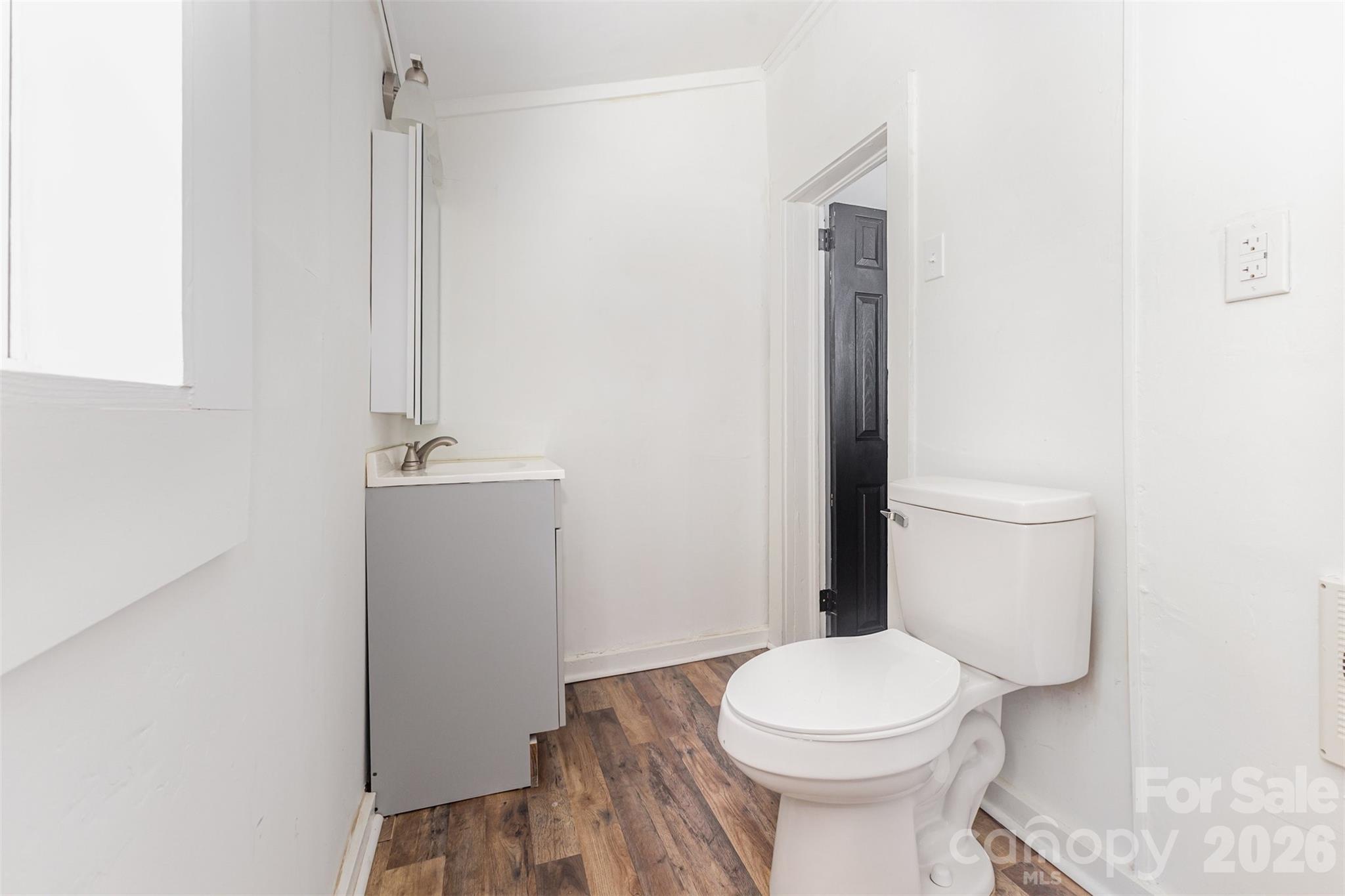 664 Simpson Street Rock Hill, SC 29730 - Photo 12 of 23 a bathroom with a toilet and a sink