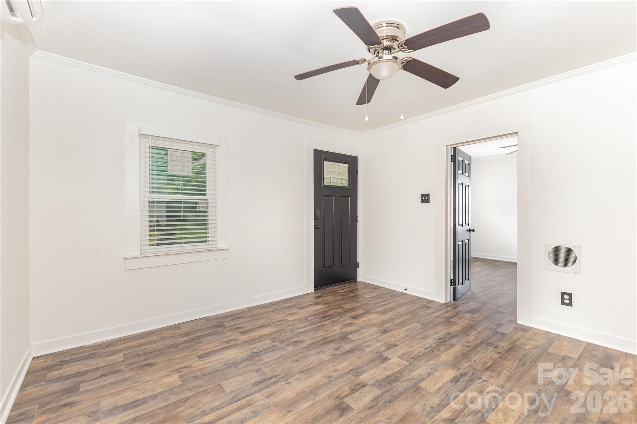 664 Simpson Street Rock Hill, SC 29730 - Photo 4 of 23 a view of an empty room with a window