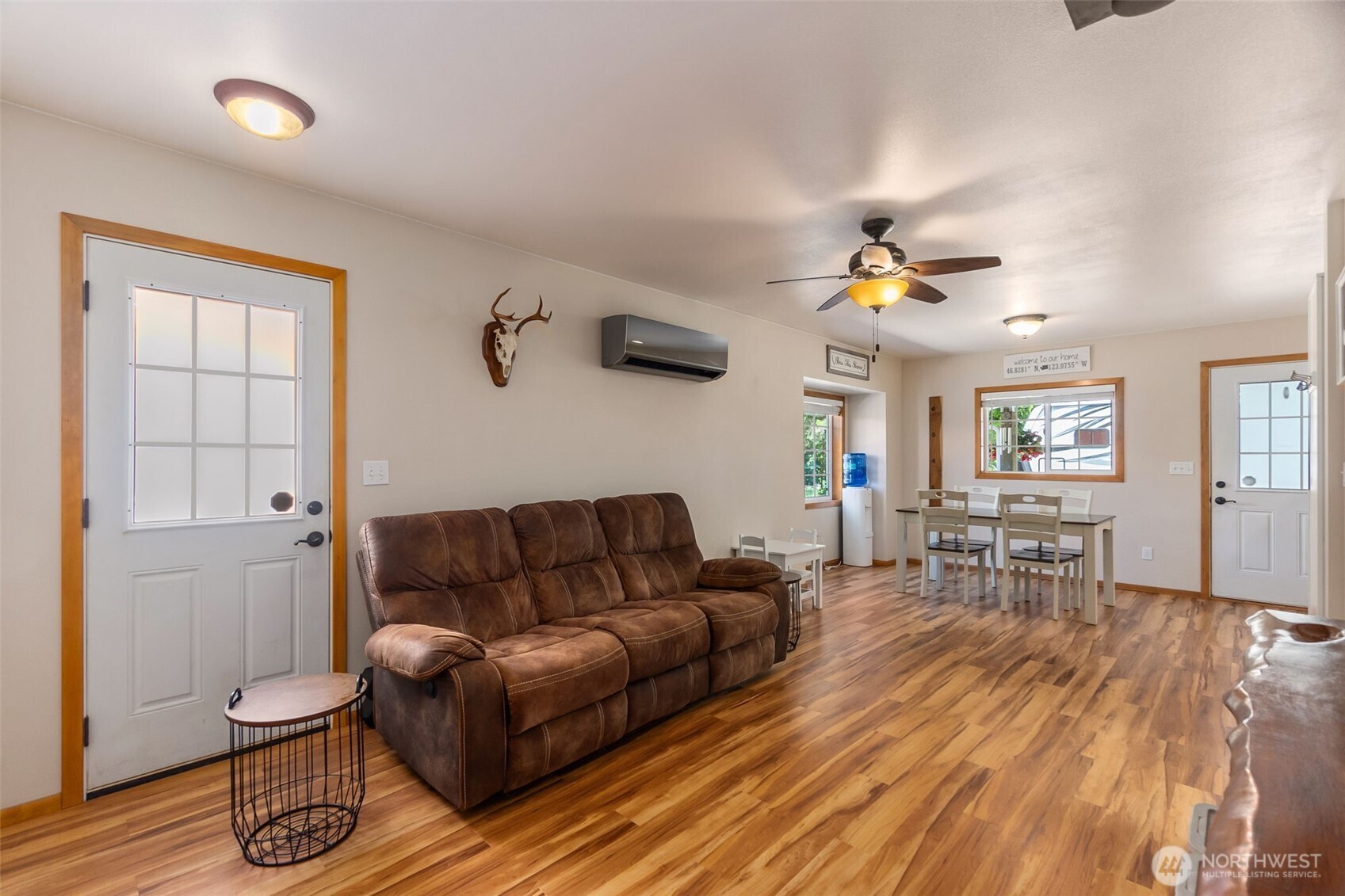 327 Garrard Creek Road Rochester, WA 98579 - Photo 21 of 40 a living room with furniture and wooden floor