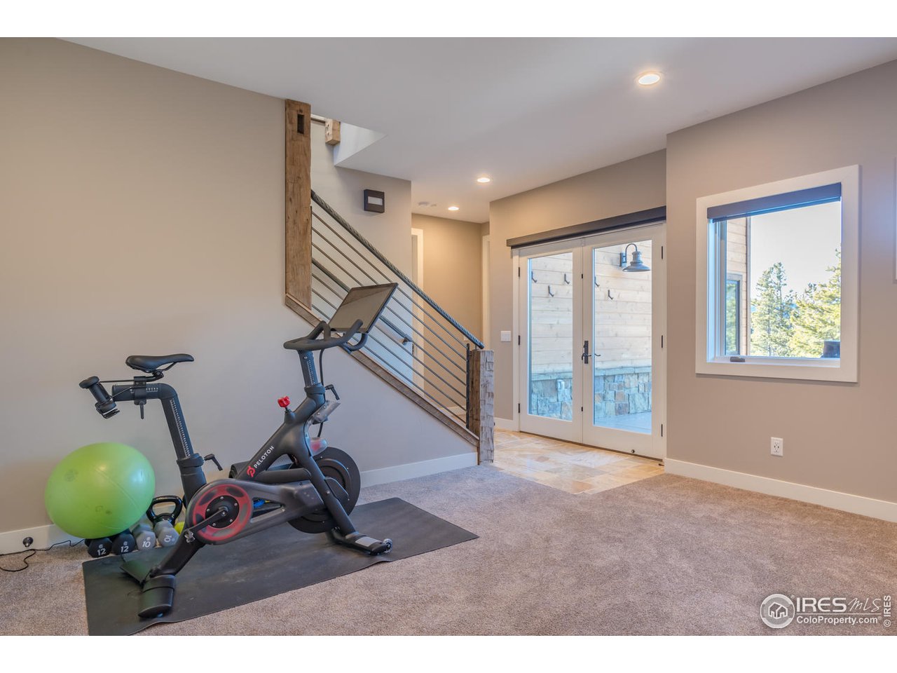 21 Ridge View Road Nederland, CO 80466 - Photo 25 of 40 Rec/family rm w/doors to patio