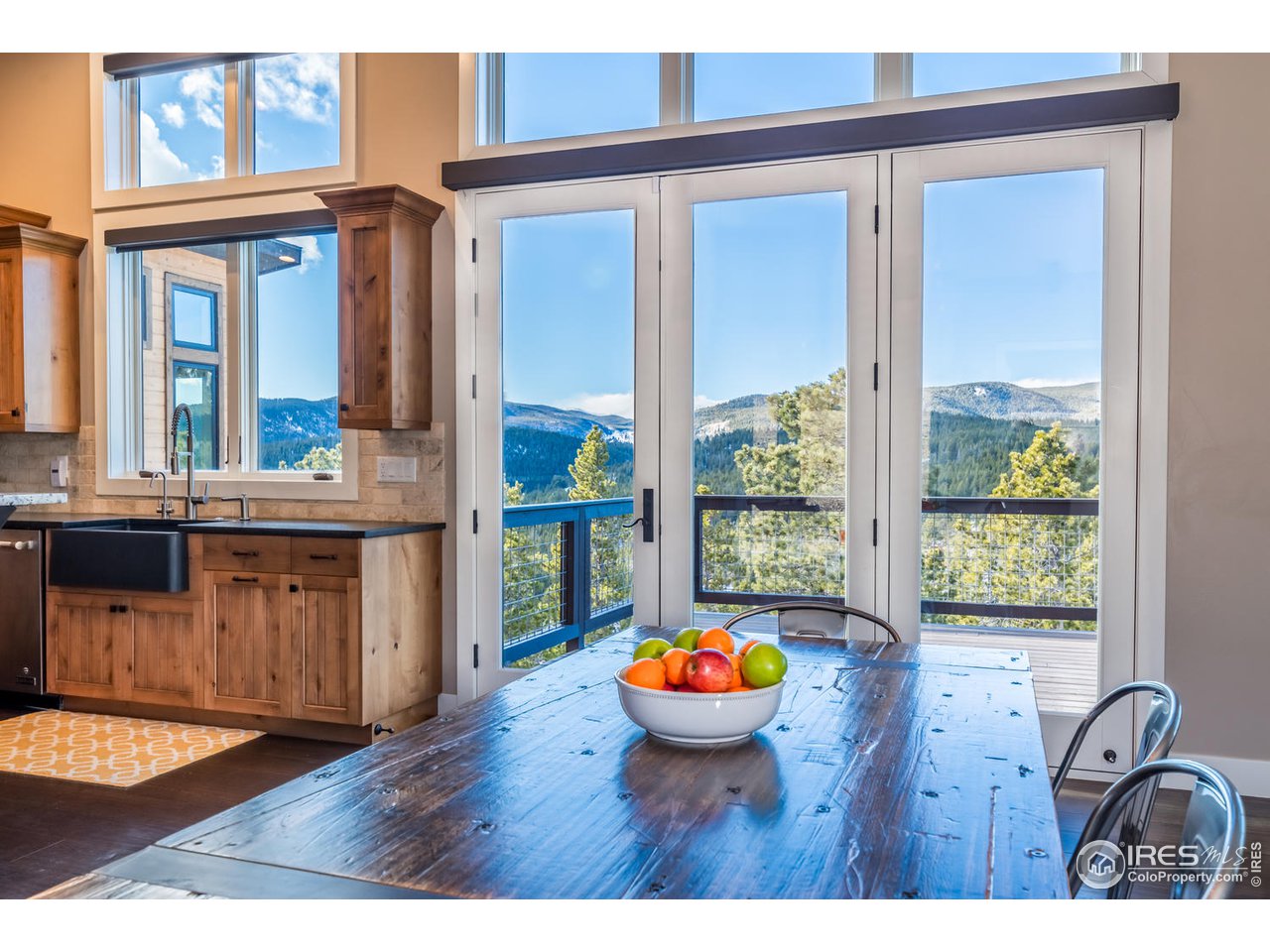 21 Ridge View Road Nederland, CO 80466 - Photo 10 of 40 Dining table to deck