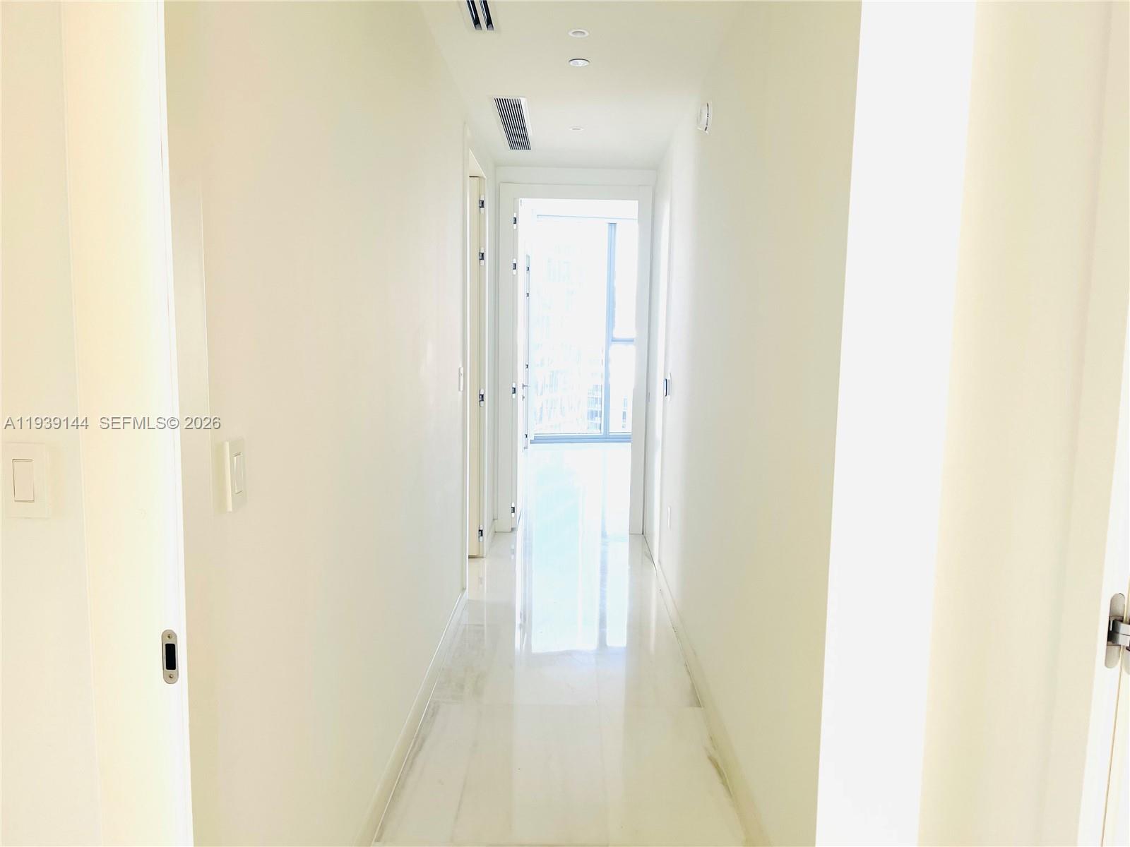 300 Biscayne Blvd Way, Unit 2807 Miami, FL 33131 - Photo 32 of 59 a view of a bathroom with a shower