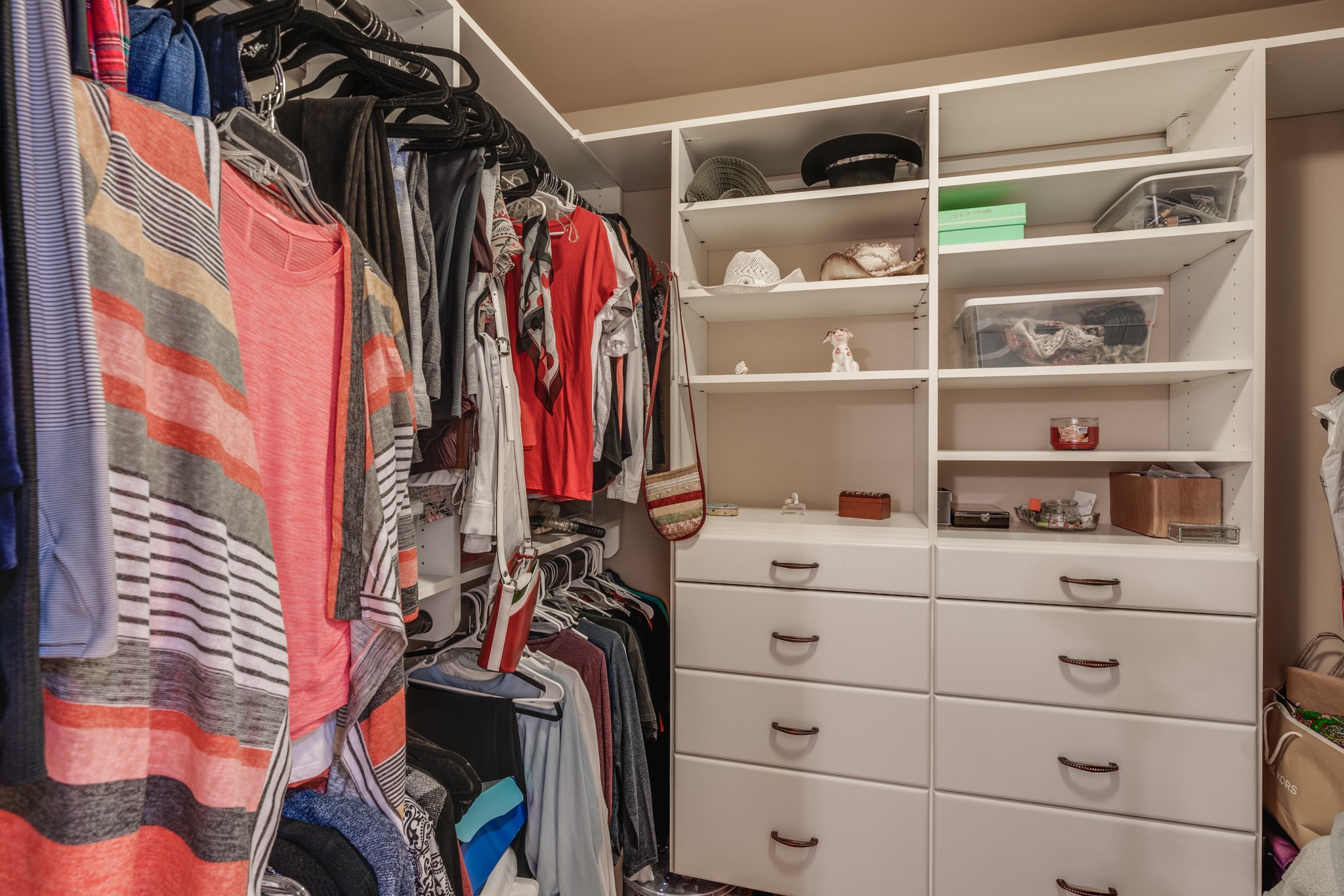 7139 New Hope Road Fairview, TN 37062 - Photo 22 of 41 a view of walk in closet with clothes and shoes