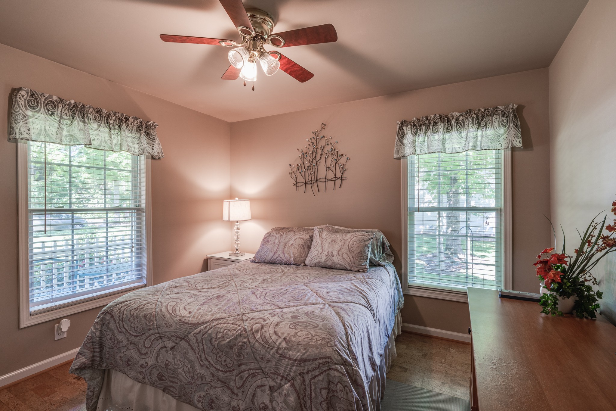 7139 New Hope Road Fairview, TN 37062 - Photo 24 of 41 a bedroom with a large bed and a chandelier
