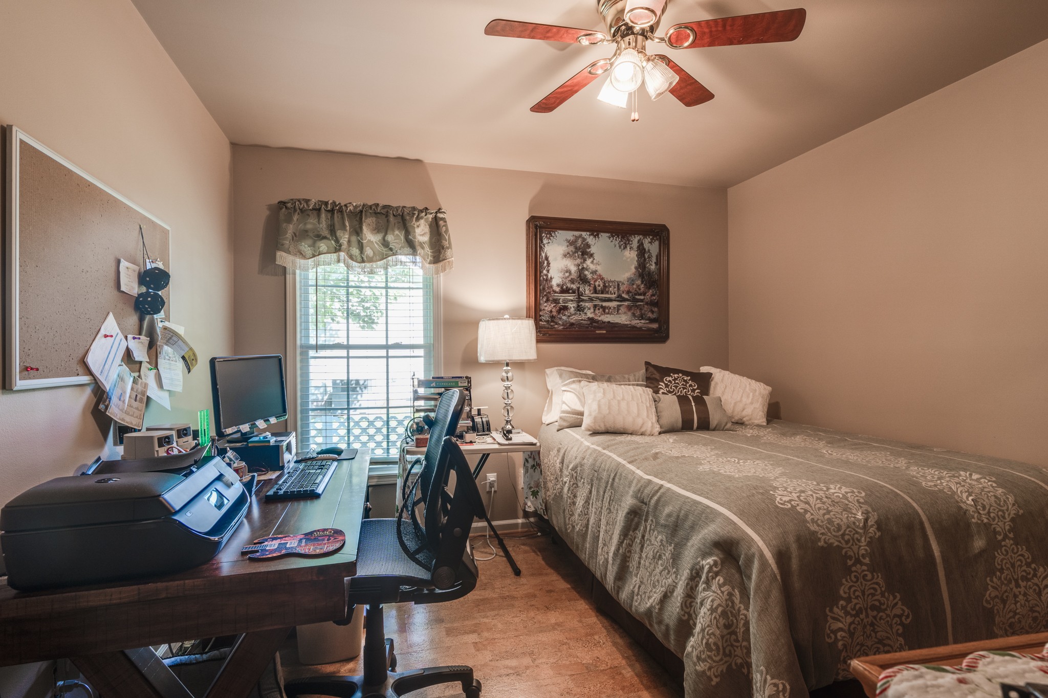 7139 New Hope Road Fairview, TN 37062 - Photo 27 of 41 a bedroom with a bed and wooden floor
