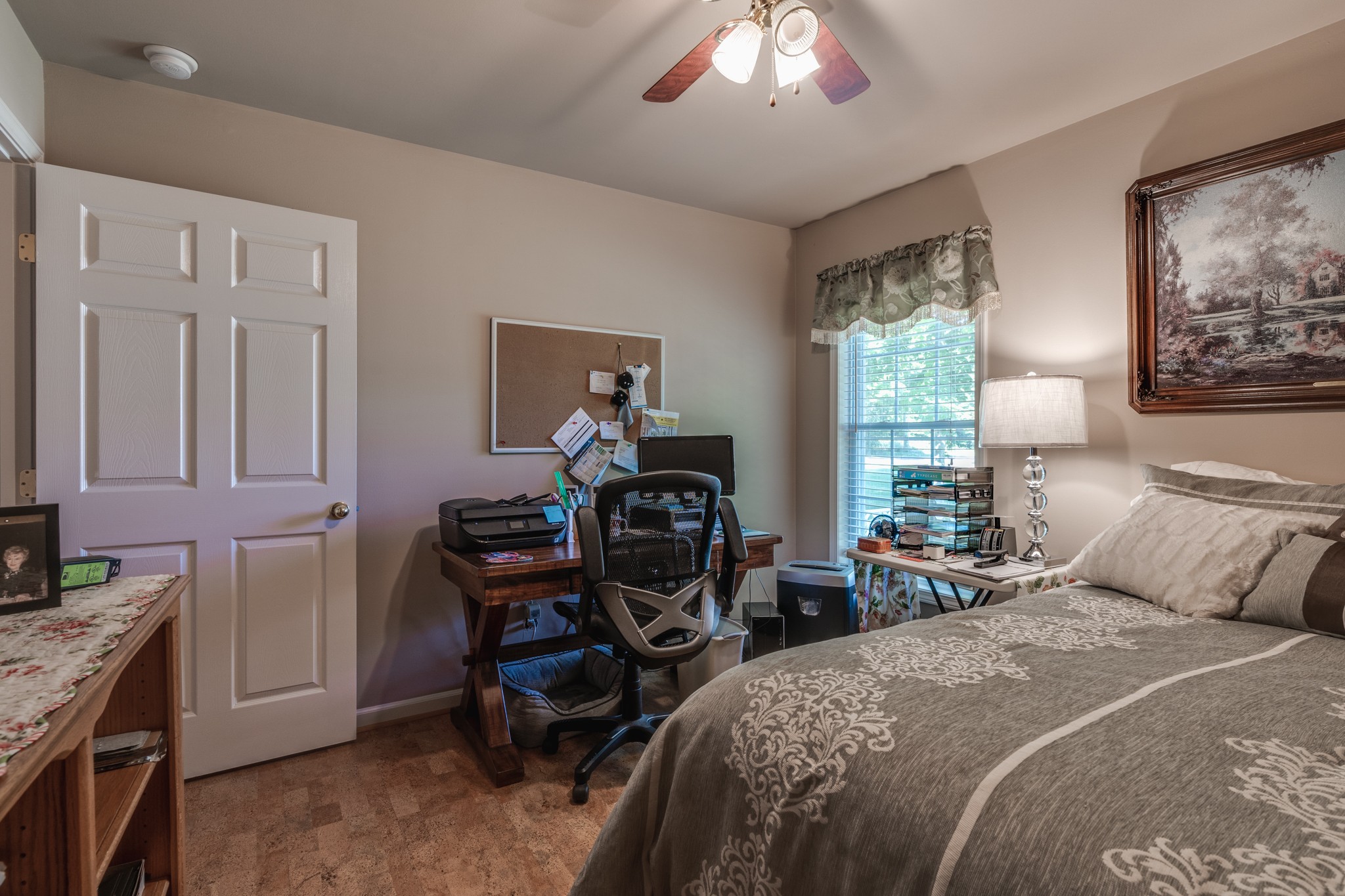 7139 New Hope Road Fairview, TN 37062 - Photo 28 of 41 a bedroom with two beds and a chandelier