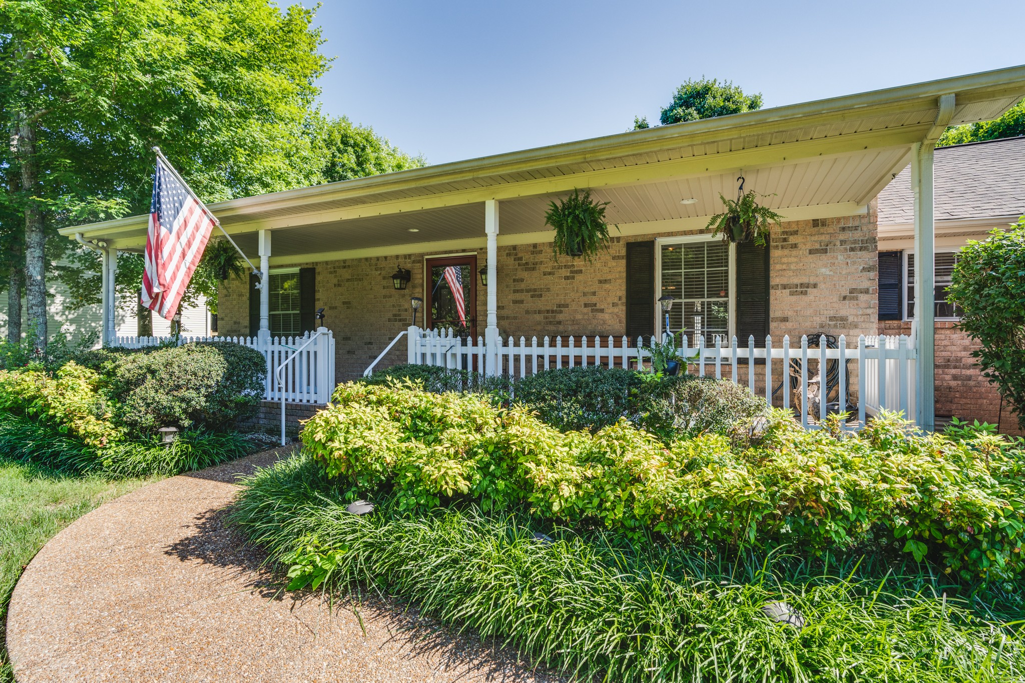 7139 New Hope Road Fairview, TN 37062 - Photo 4 of 41 front view of a house with a garden