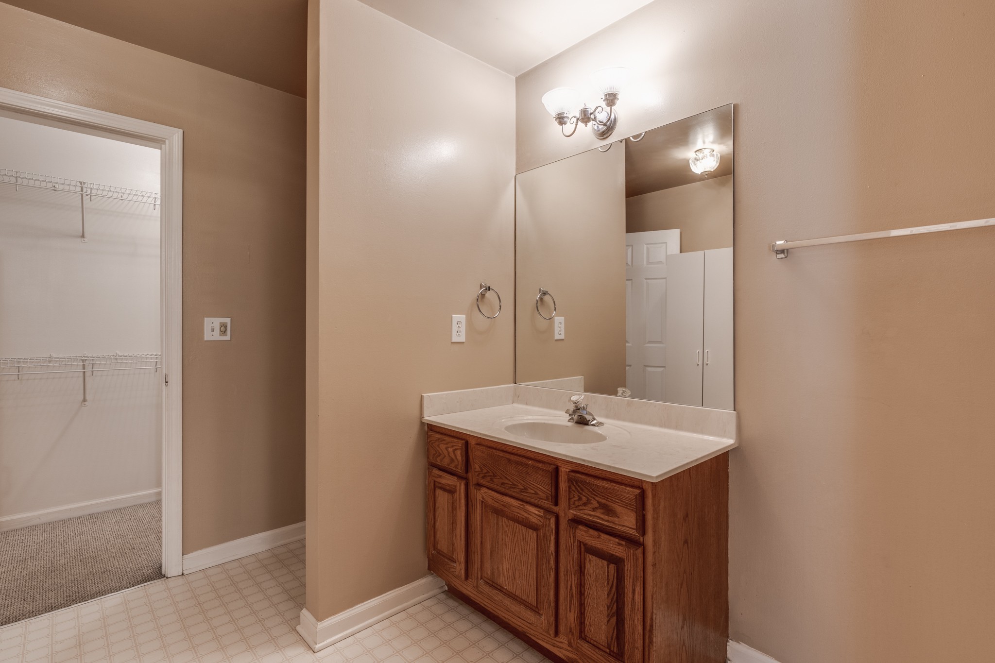 7139 New Hope Road Fairview, TN 37062 - Photo 35 of 41 a bathroom with a sink a mirror and a shower