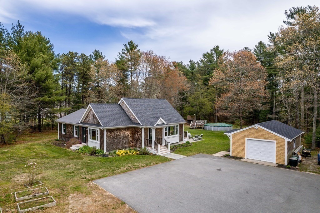 558 County Road Wareham, MA 02576 - Photo 1 of 32 a aerial view of a house with a yard and large trees