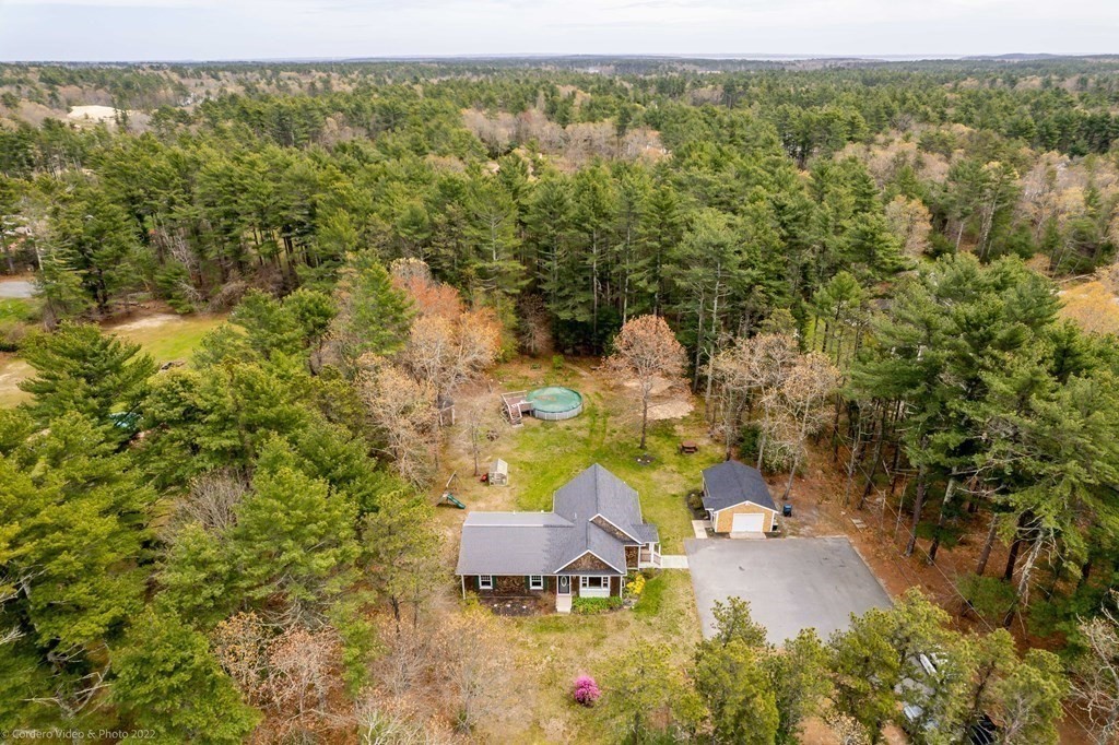 558 County Road Wareham, MA 02576 - Photo 2 of 32 a view of a city with lush green forest