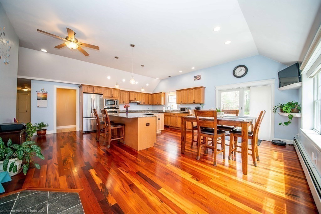 558 County Road Wareham, MA 02576 - Photo 3 of 32 a living room with dining room and wooden floor