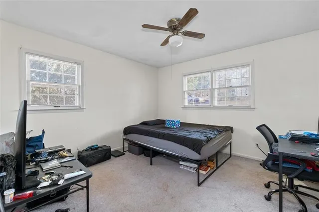 a room with furniture and a window