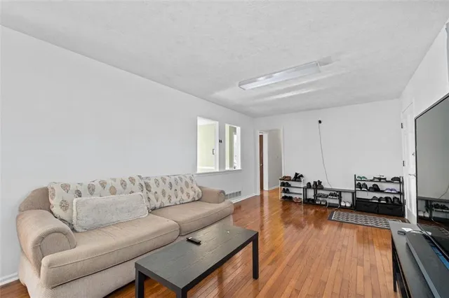 a living room with furniture or wooden floor