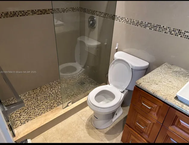 a bathroom with a sink and a toilet