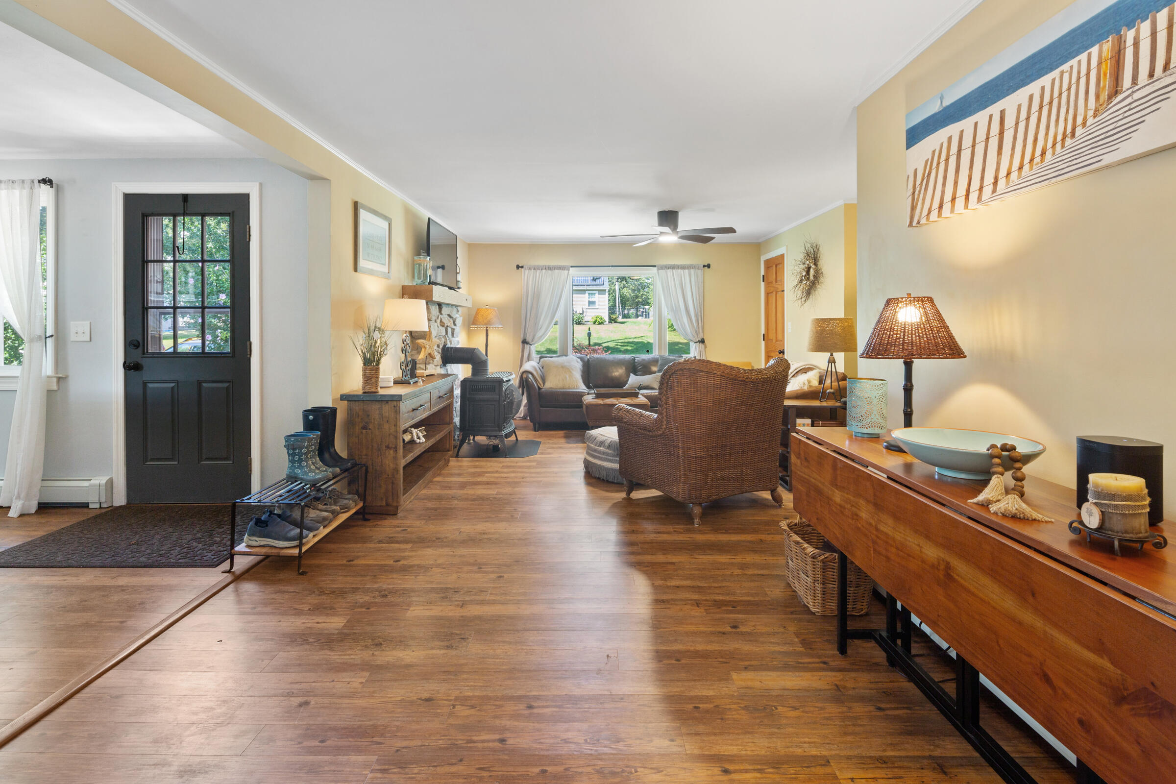 31 Soundview Road Centerville, MA 02632 - Photo 11 of 50 a living room with furniture a window and a wooden floor