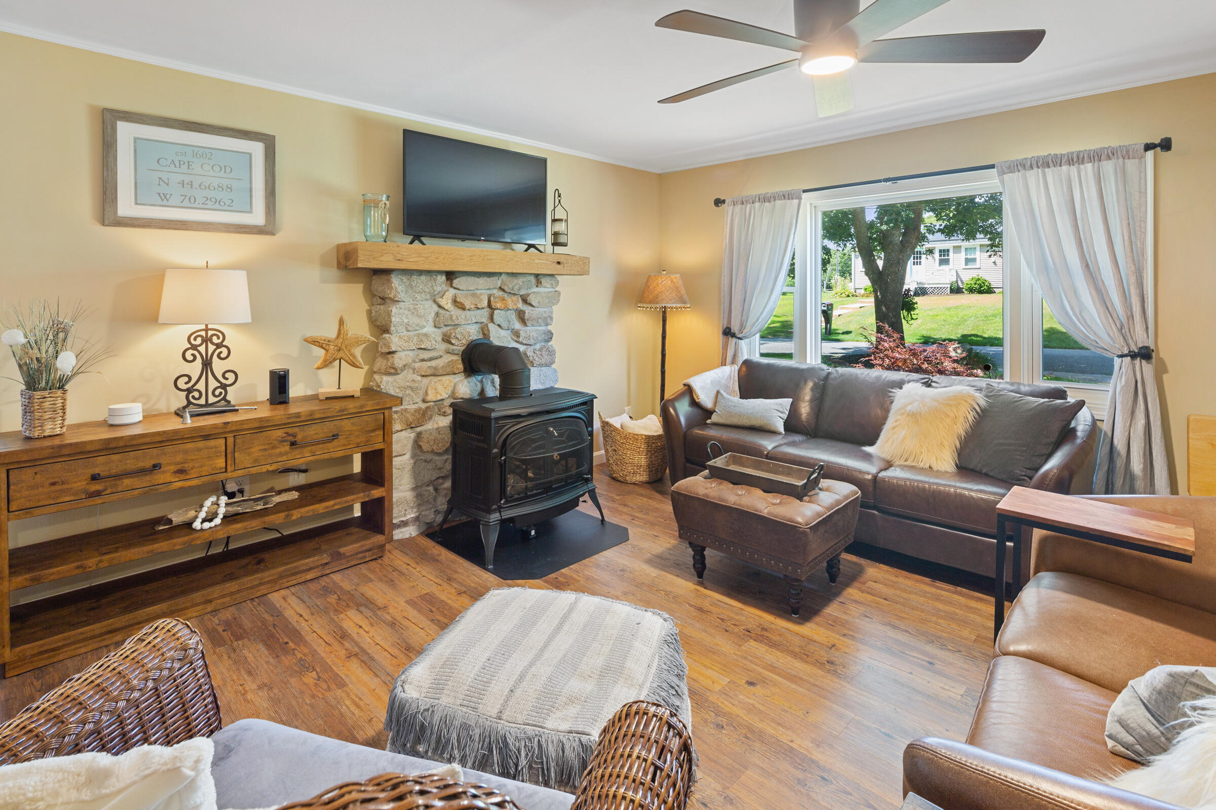 31 Soundview Road Centerville, MA 02632 - Photo 13 of 50 a living room with furniture and a flat screen tv