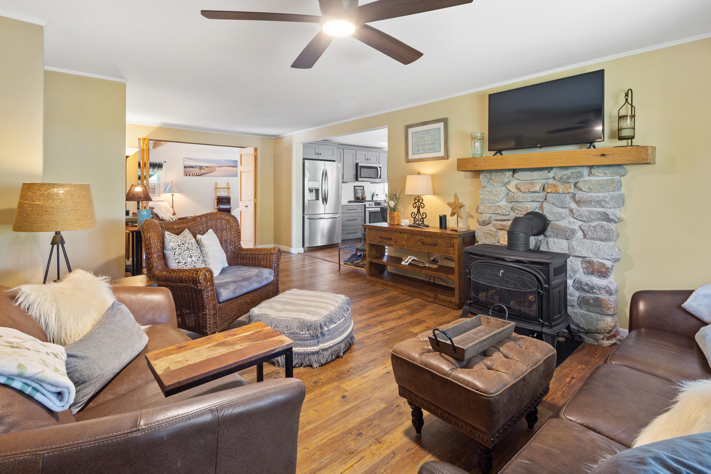 31 Soundview Road Centerville, MA 02632 - Photo 14 of 50 a living room with furniture and a flat screen tv