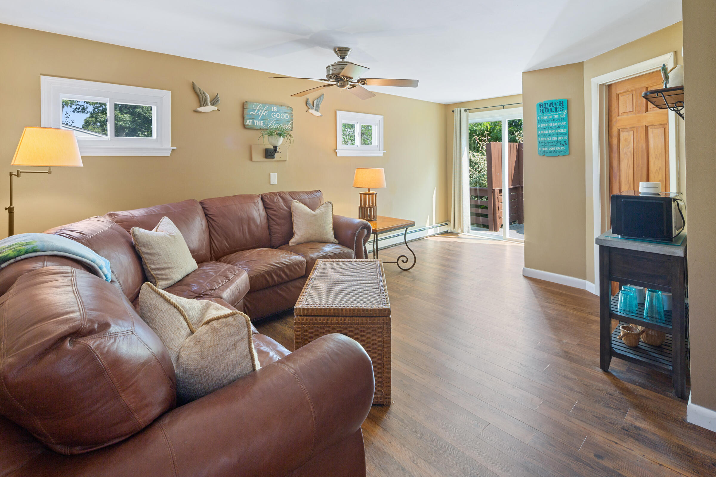 31 Soundview Road Centerville, MA 02632 - Photo 21 of 50 a living room with furniture and a flat screen tv