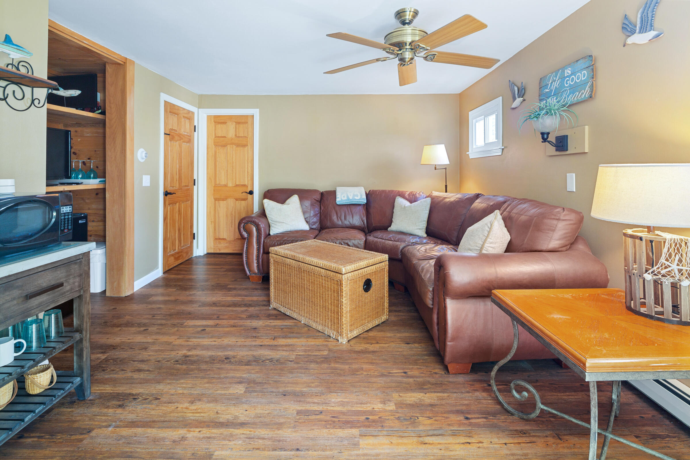 31 Soundview Road Centerville, MA 02632 - Photo 22 of 50 a living room with furniture and a wooden floor