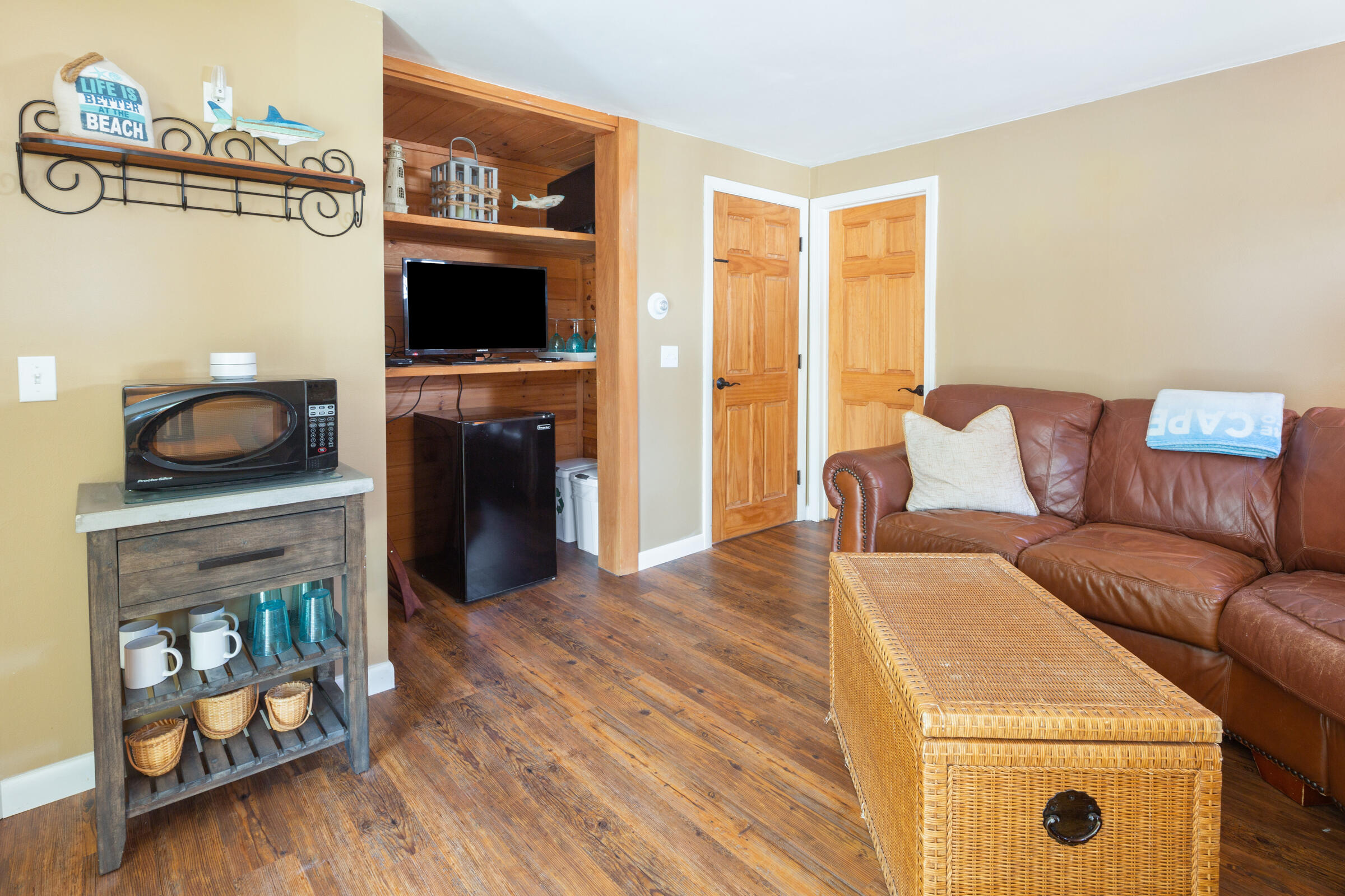 31 Soundview Road Centerville, MA 02632 - Photo 23 of 50 a living room with furniture and a flat screen tv