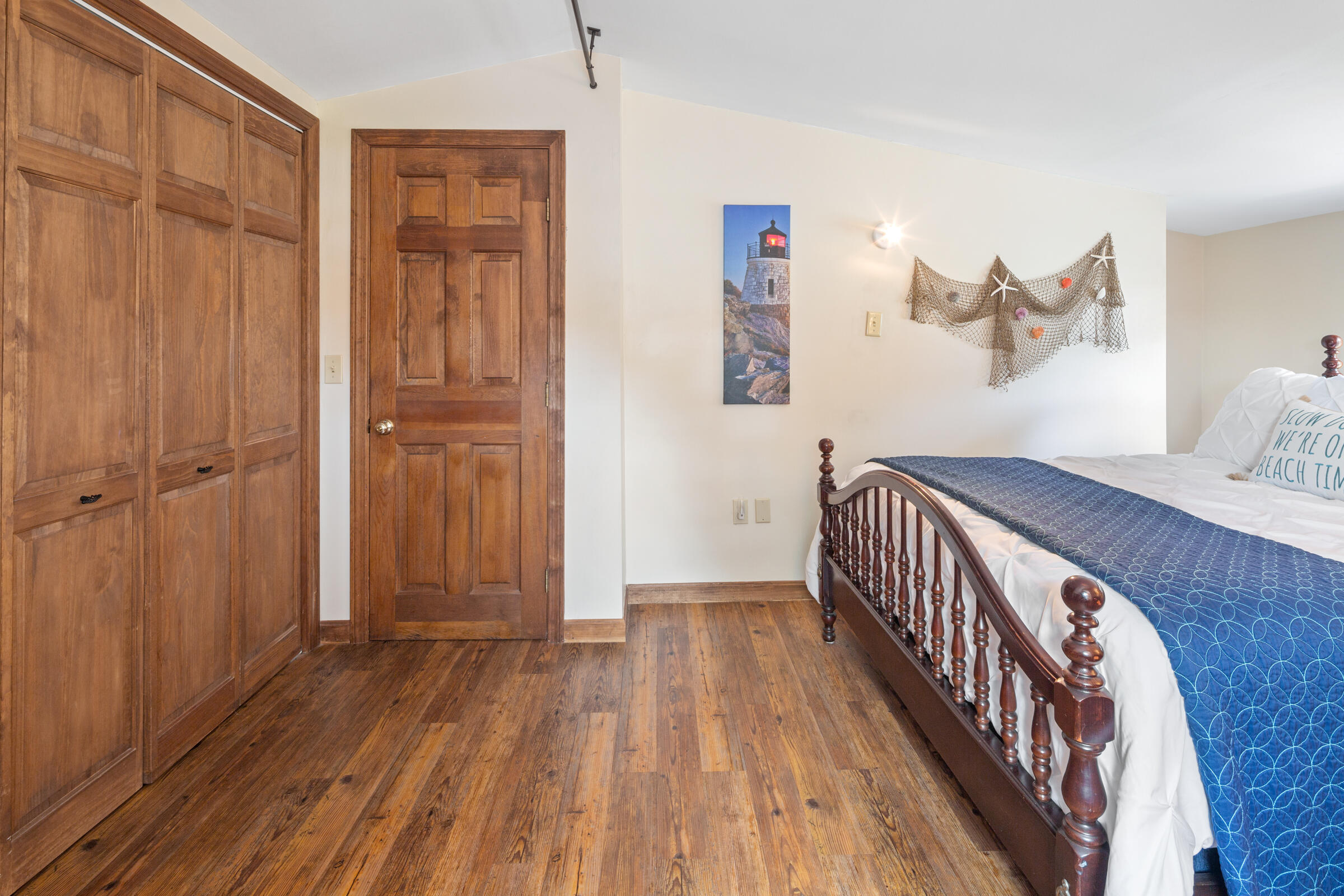 31 Soundview Road Centerville, MA 02632 - Photo 28 of 50 a view of a bedroom with wooden floor
