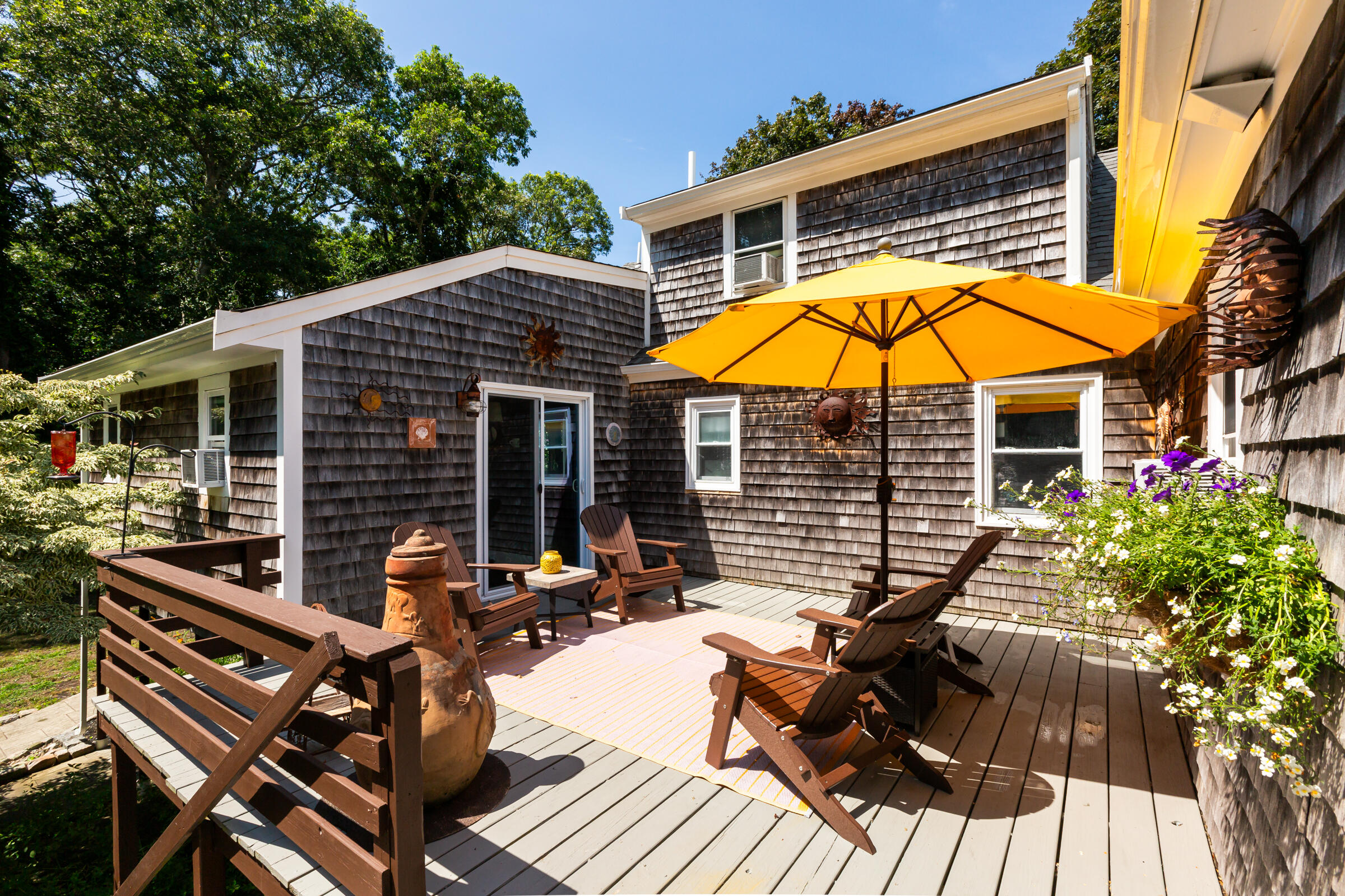31 Soundview Road Centerville, MA 02632 - Photo 3 of 50 a view of a house with backyard and sitting area