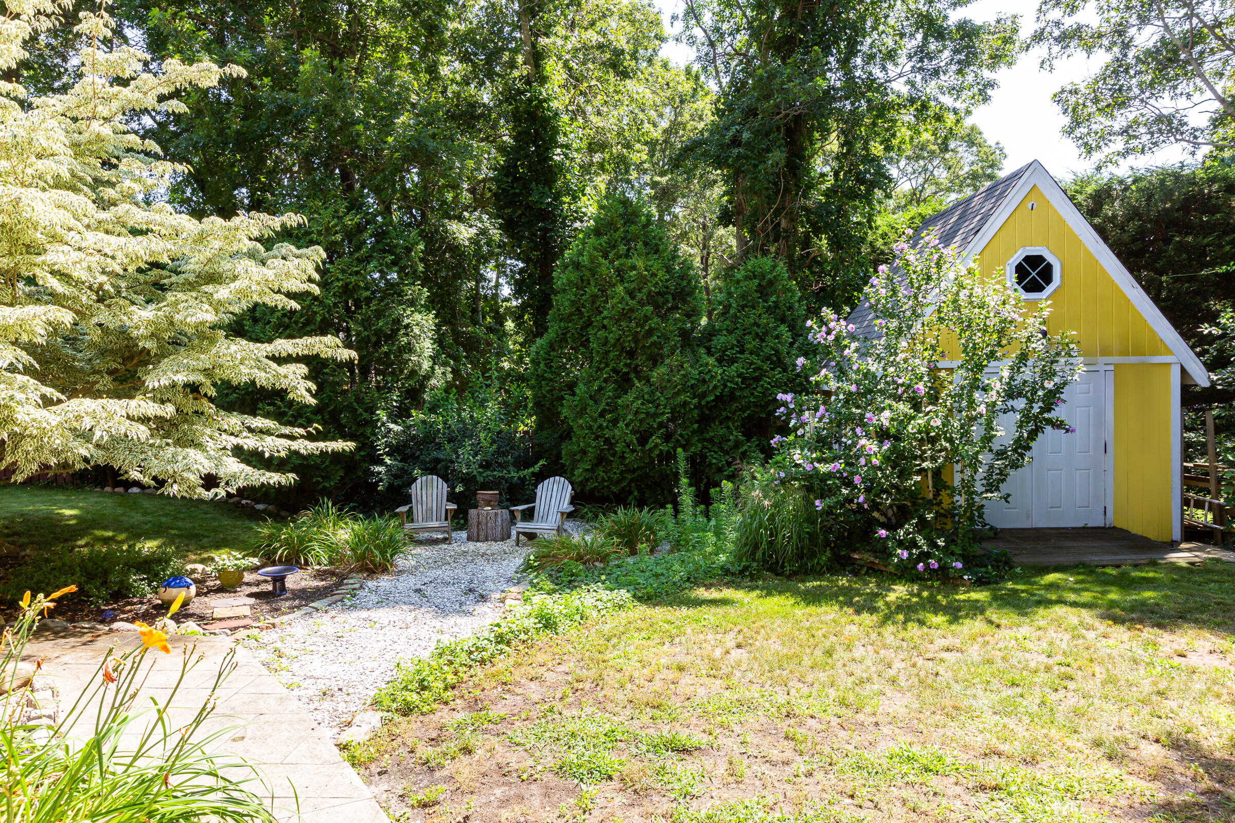 31 Soundview Road Centerville, MA 02632 - Photo 35 of 50 a small garden covered with tall trees