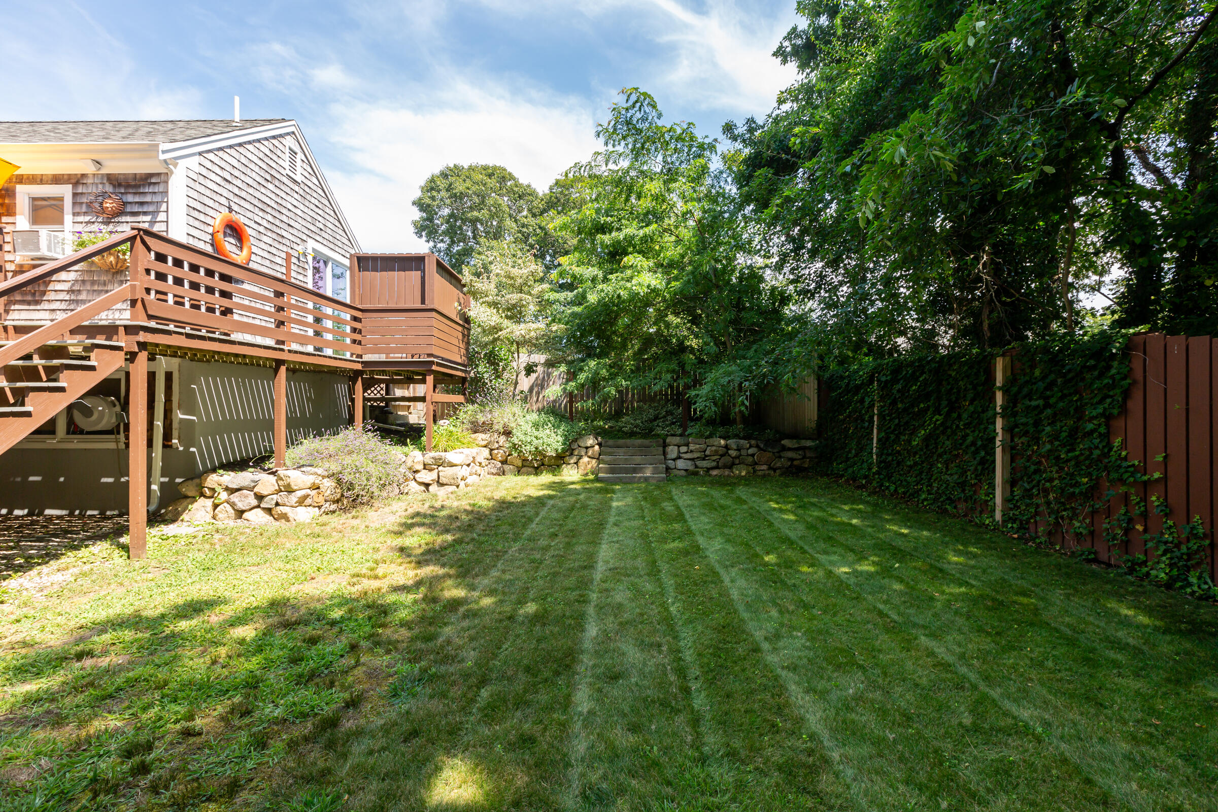 31 Soundview Road Centerville, MA 02632 - Photo 37 of 50 a front view of a house with garden