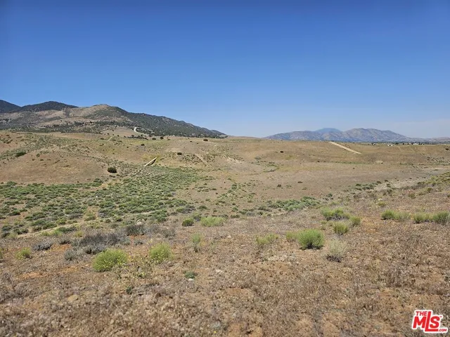 a view of mountain with lake view