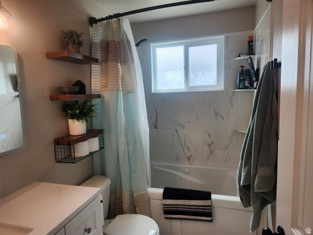 705 North 700 East Payson, UT 84651 - Photo 14 of 30 Bathroom with vanity and shower / bath combination with curtain
