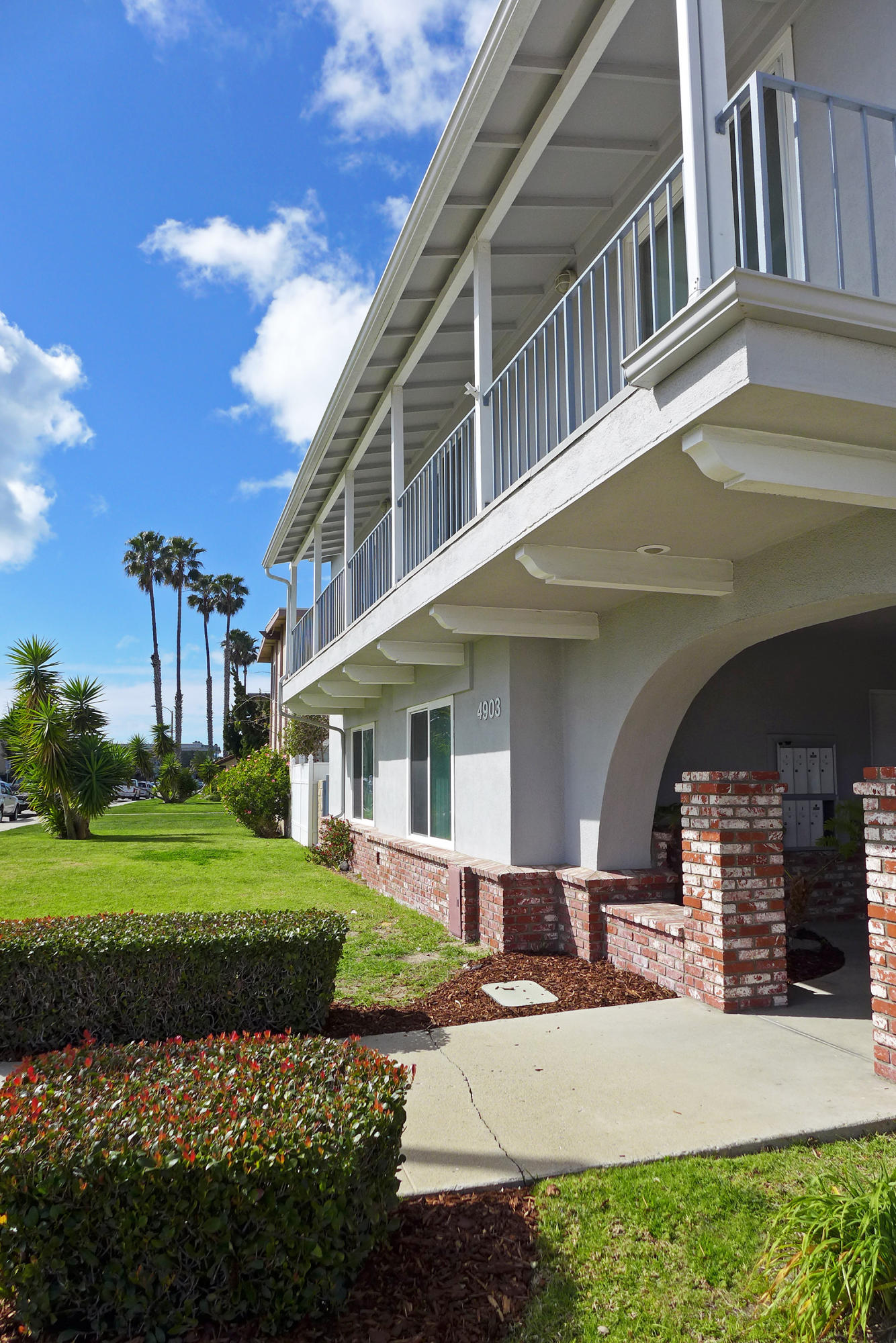 4903 Nautilus Street Oxnard, CA 93035 - Photo 4 of 10 a front view of a house with a garden