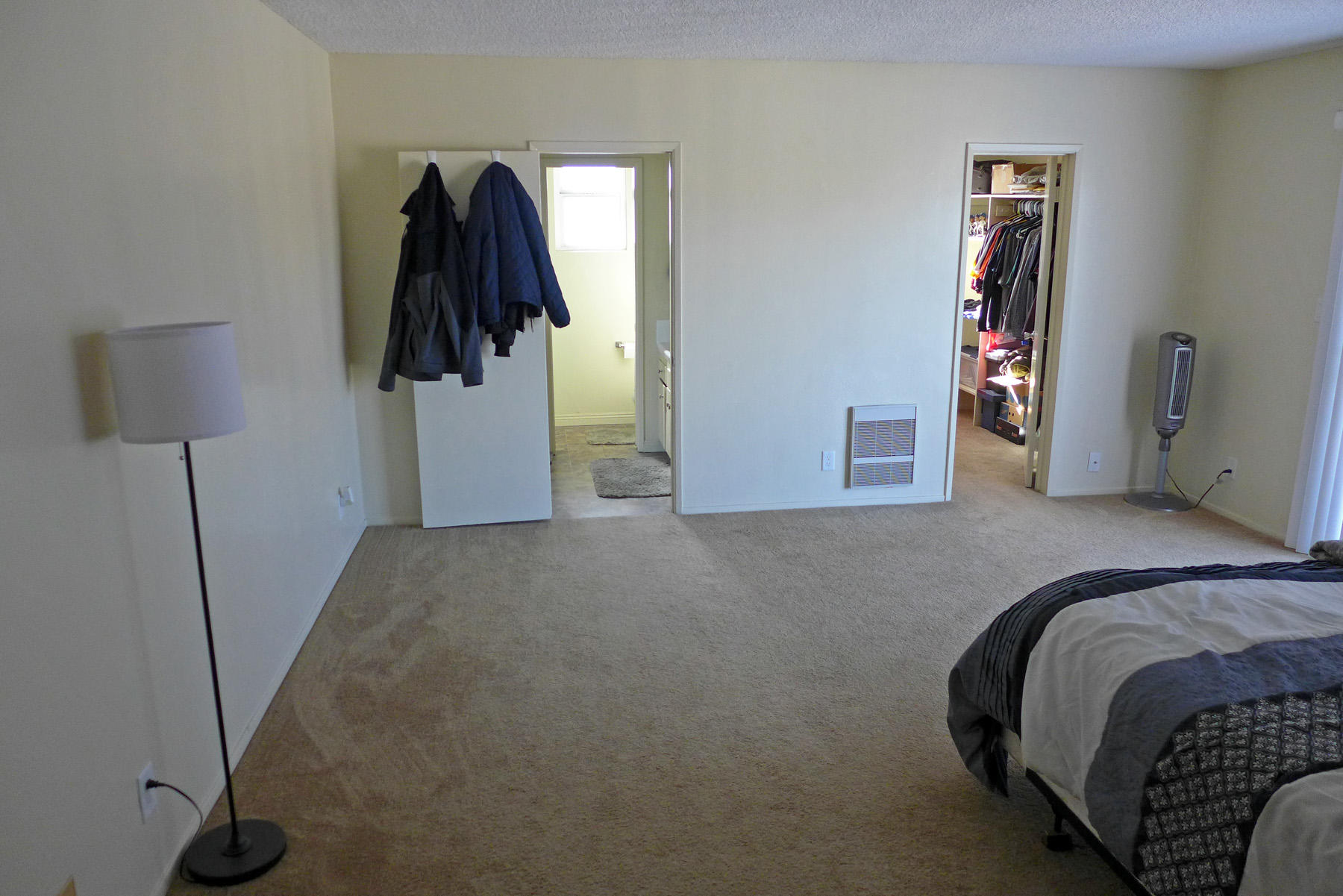 4903 Nautilus Street Oxnard, CA 93035 - Photo 7 of 10 a bed room with a bed and a walk in closet