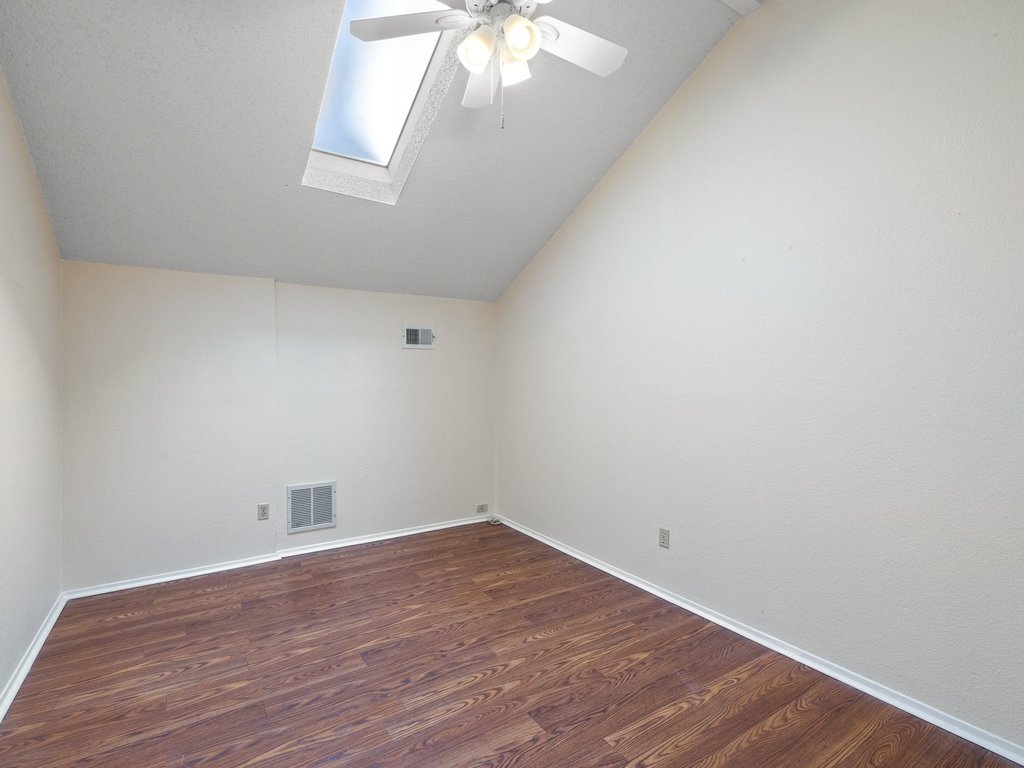 4711 Fieldstone Drive Austin, TX 78735 - Photo 23 of 40 wooden floor in an empty room