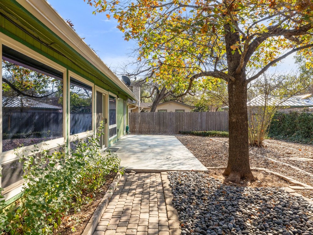 4711 Fieldstone Drive Austin, TX 78735 - Photo 26 of 40 a backyard of a house with lots of green space