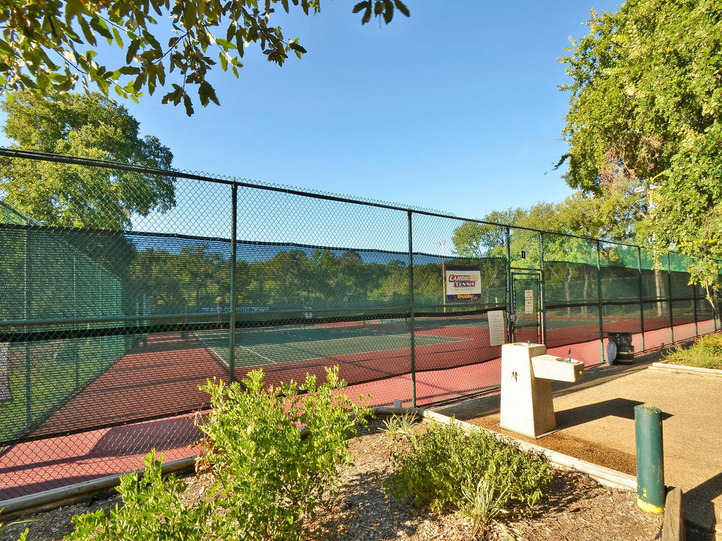 4711 Fieldstone Drive Austin, TX 78735 - Photo 37 of 40 View of tennis court featuring a gate