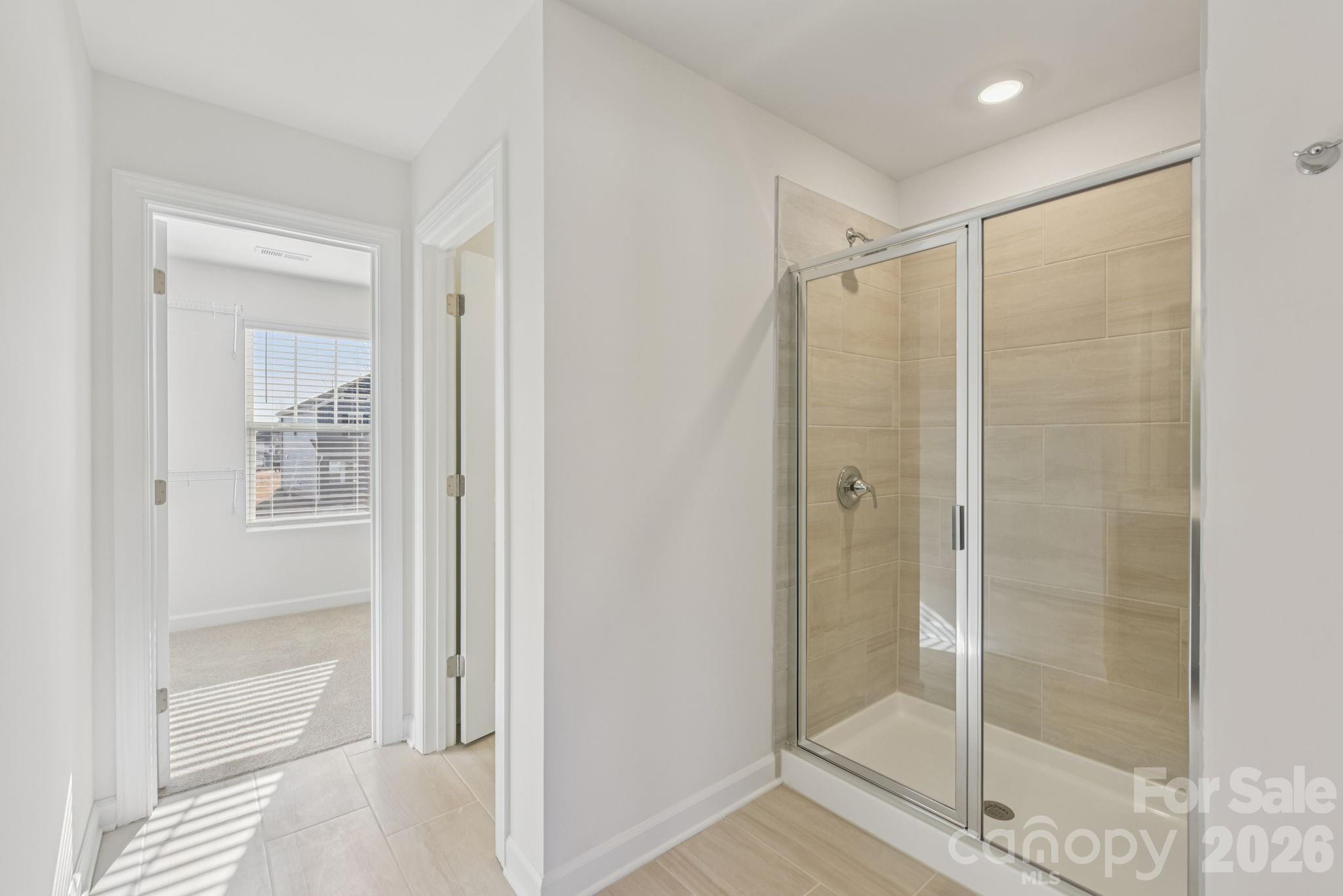 178 Murphy Mdw Road Mocksville, NC 27028 - Photo 20 of 22 a bathroom with a glass shower door