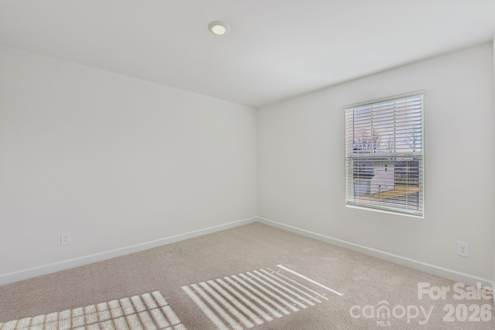 178 Murphy Mdw Road Mocksville, NC 27028 - Photo 9 of 22 an empty room with a window