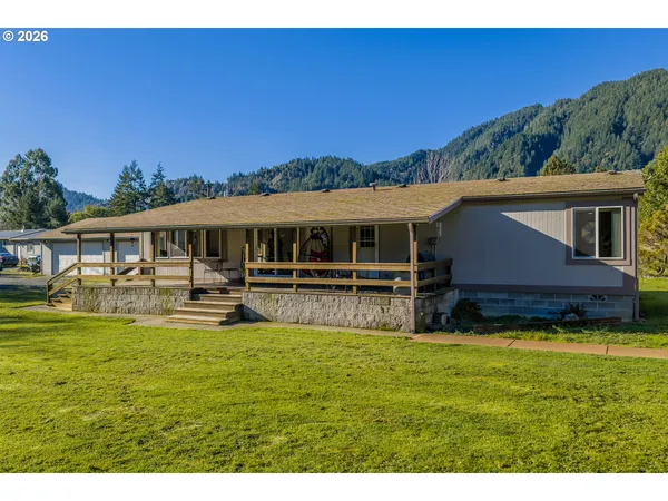 a view of a house with a big yard