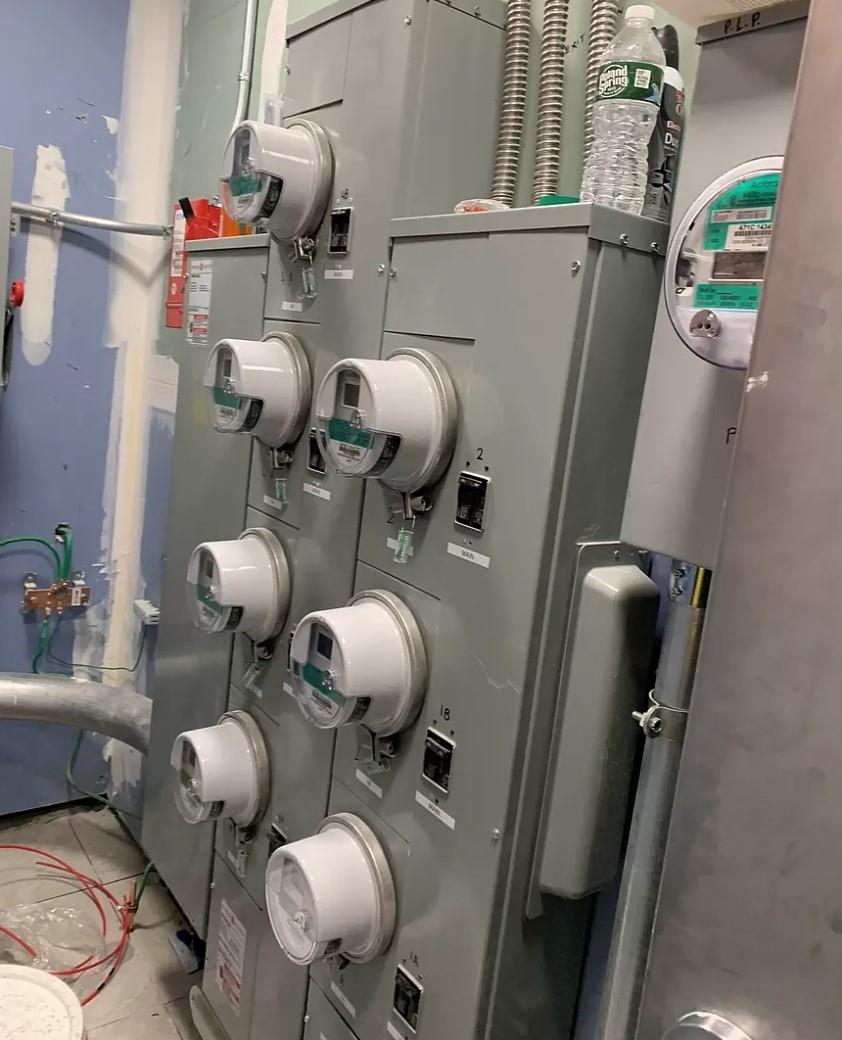 37-28 104th Street Queens, NY 11368 - Photo 10 of 11 a bathroom with a sink mirror vanity and toilet